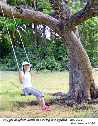 My god-daughter Nestle on a swing at Kaypalad
