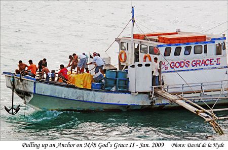 God's Grace II pulling up anchor at Tilik, Lubang Island 