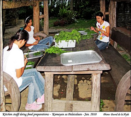 Kitchen staff doing food preparation at Kamayan sa Palaisdaan
