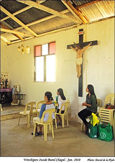 Worshipers inside Burol Chapel - Cabra Island. 