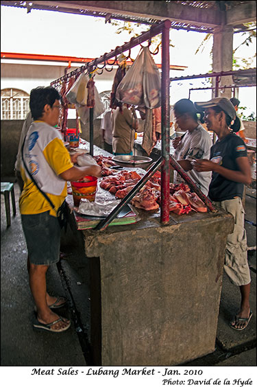 Meat sales at Lubang Market