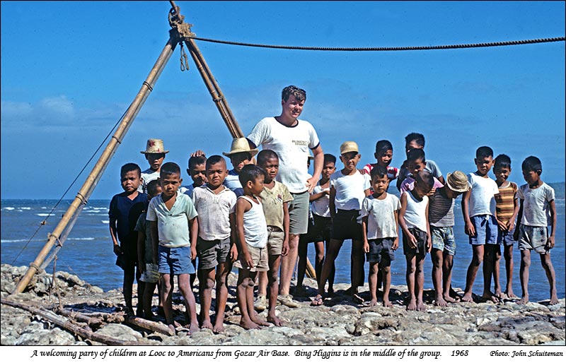 Bing Higgins with a welcoming party of children at Looc in 1968