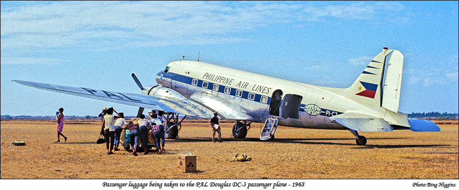 Loading PAL Douglas DC-3 with passenger luggage at Lubang Airport -1968