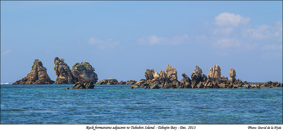 Rock formations adjacent to Tubahin Island, Tabajin Bay