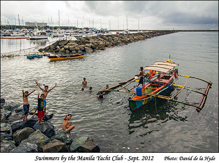 Swimmers in Manila Bay