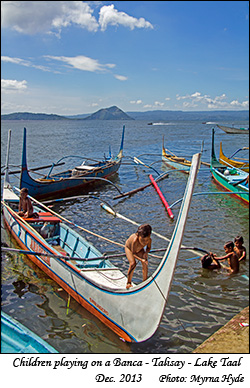 Children playing on a Banca at Talisay, Lake Taal