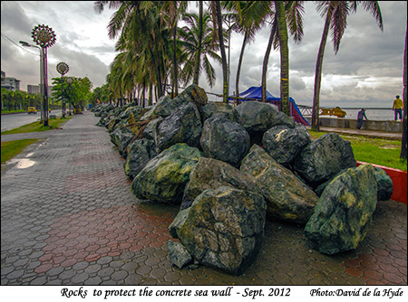 Rocks to protect the concrete sea wall