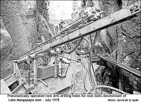 Pneumatically operated rock drill