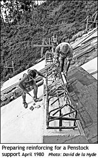 Workmen preparing reinforcing for a penstock support