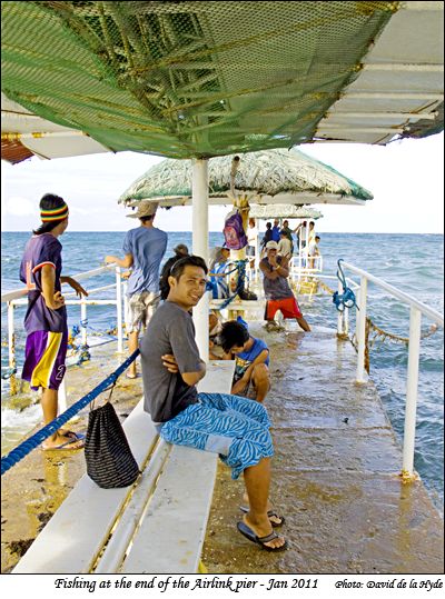 Fishing at the end of Airlink's pier