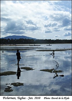 Fisherman at Tagbac beach, Lubang Island