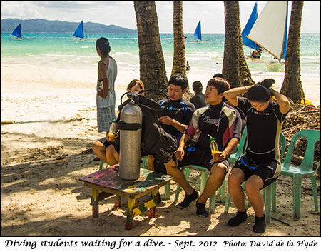Diving students waiting for the boat.