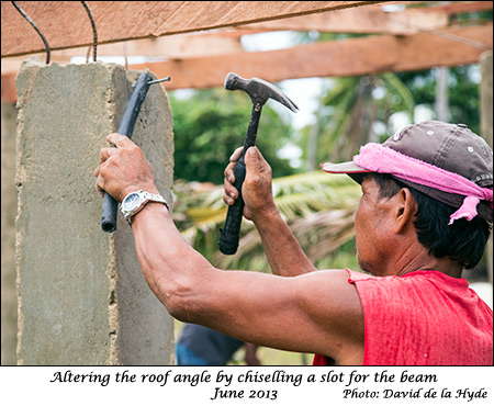 Preparing slot in a concrete column for a wooden beam